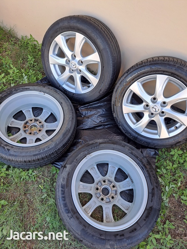 16x6.5 Original Mazda Wheels-1