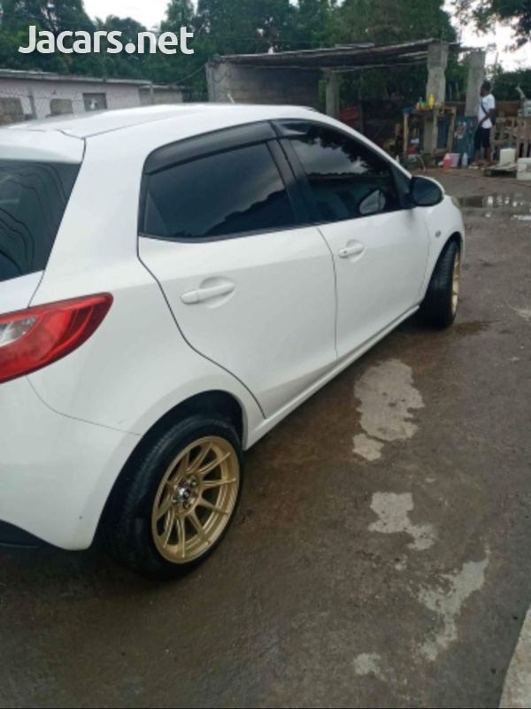 Mazda Demio 1,3L 2009-7