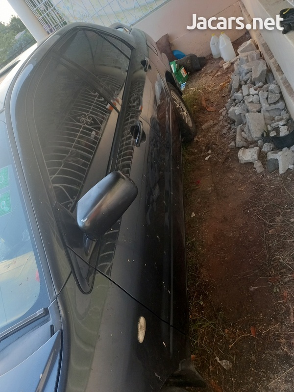Mitsubishi Lancer 1,5L 2002-7
