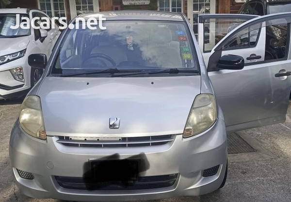 Toyota Passo 1,0L 2008-6