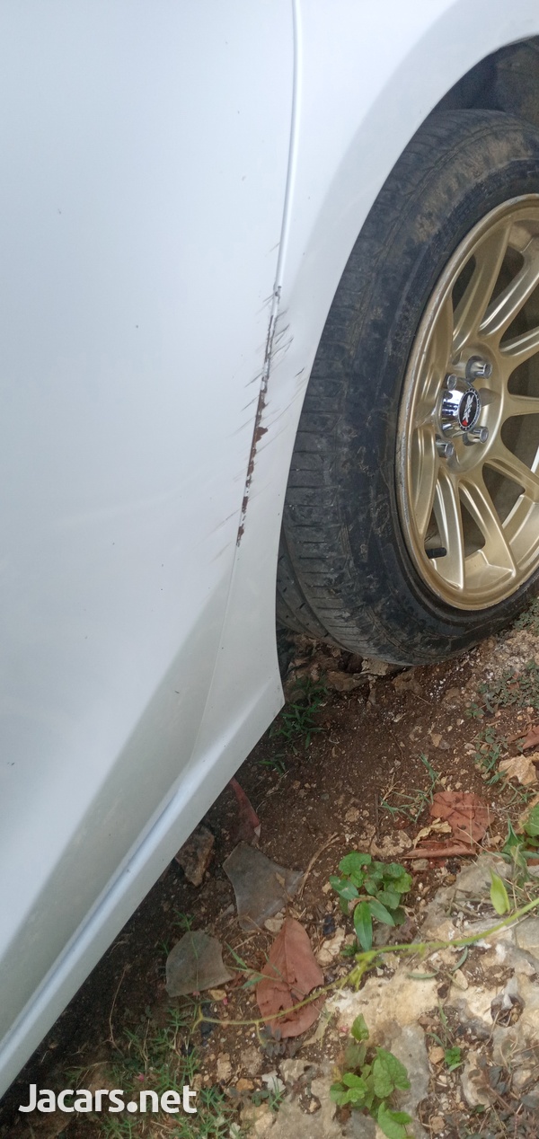 Mazda Demio 1,3L 2009-4