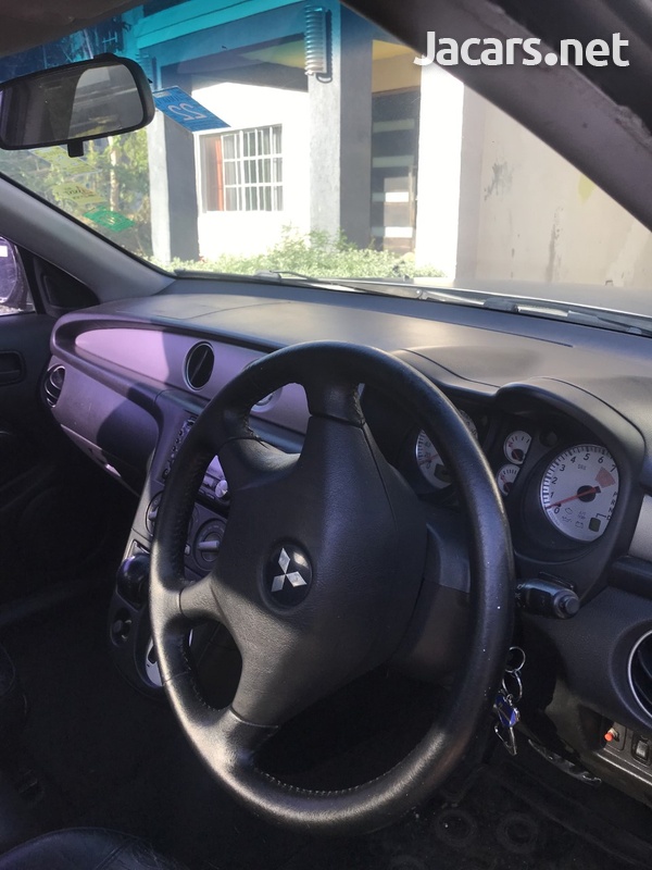 Mitsubishi Outlander or Airtrek 2,0L 2006-2