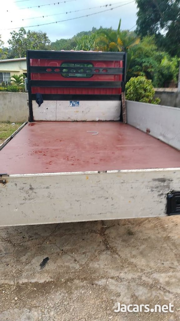 2010 Nissan drop side truck-3