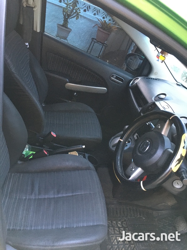 Mazda Demio 1,2L 2010-7