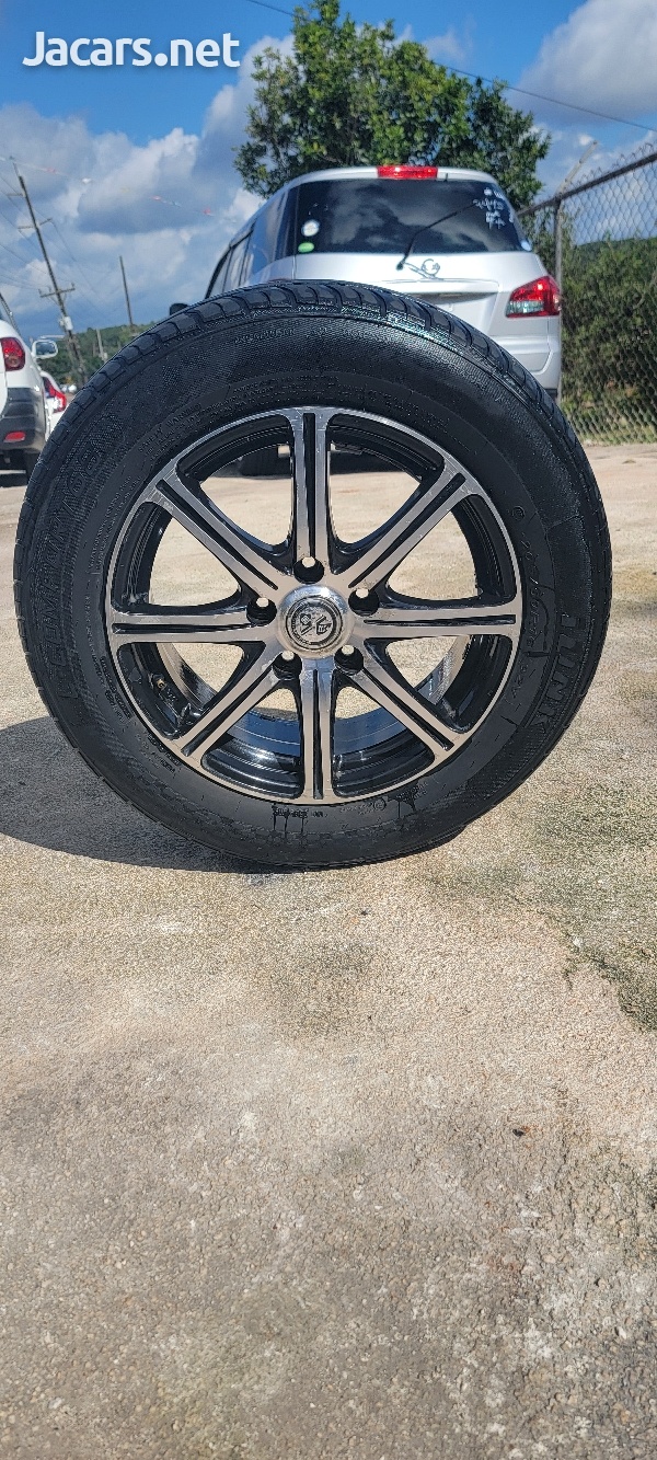 16 inch 5 lug universal rim with tire used-3