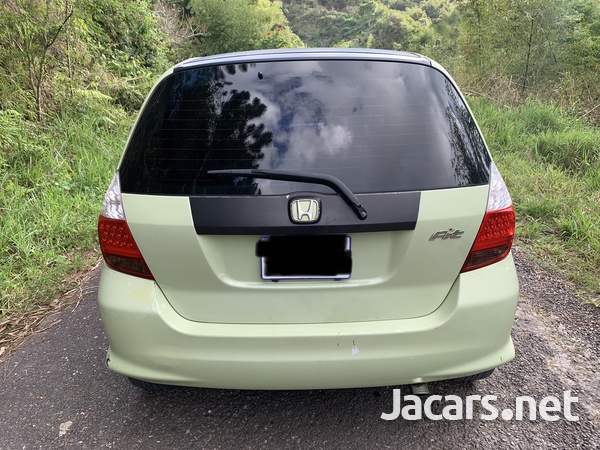 Honda Fit 1,3L 2004-9