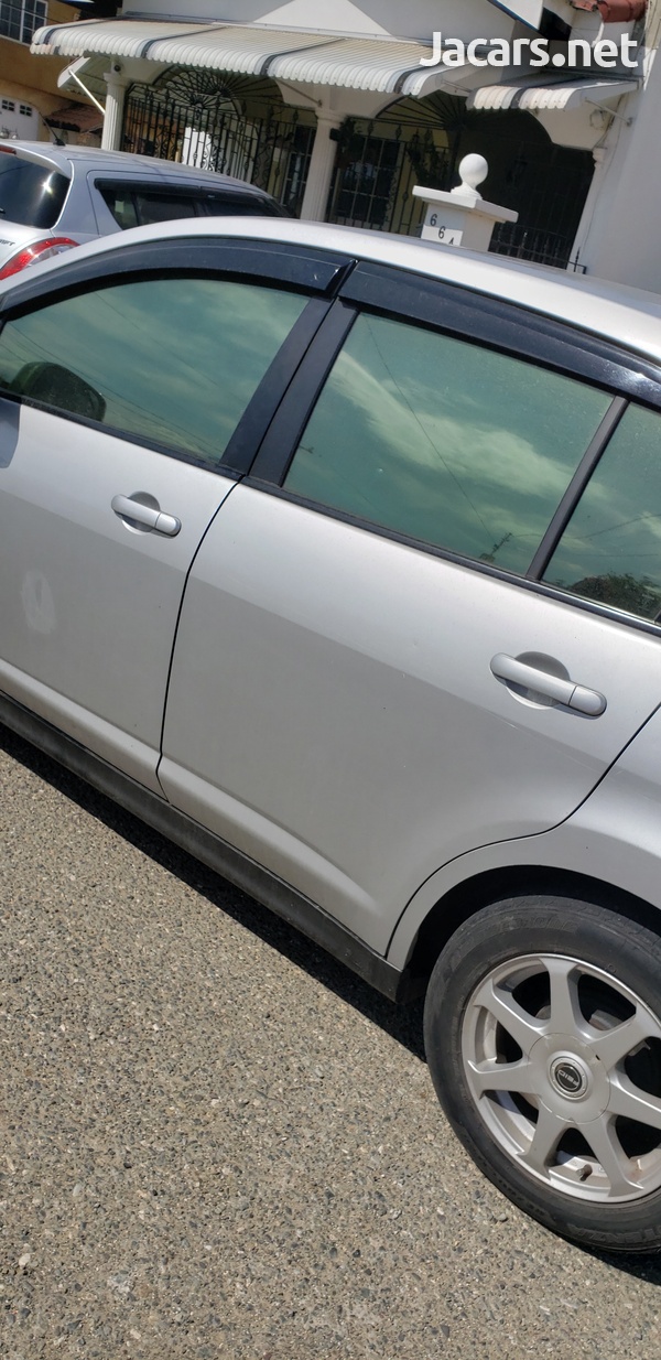 Nissan Tiida 1,8L 2011-3