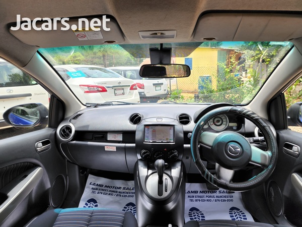Mazda Demio 1,5L 2009-7